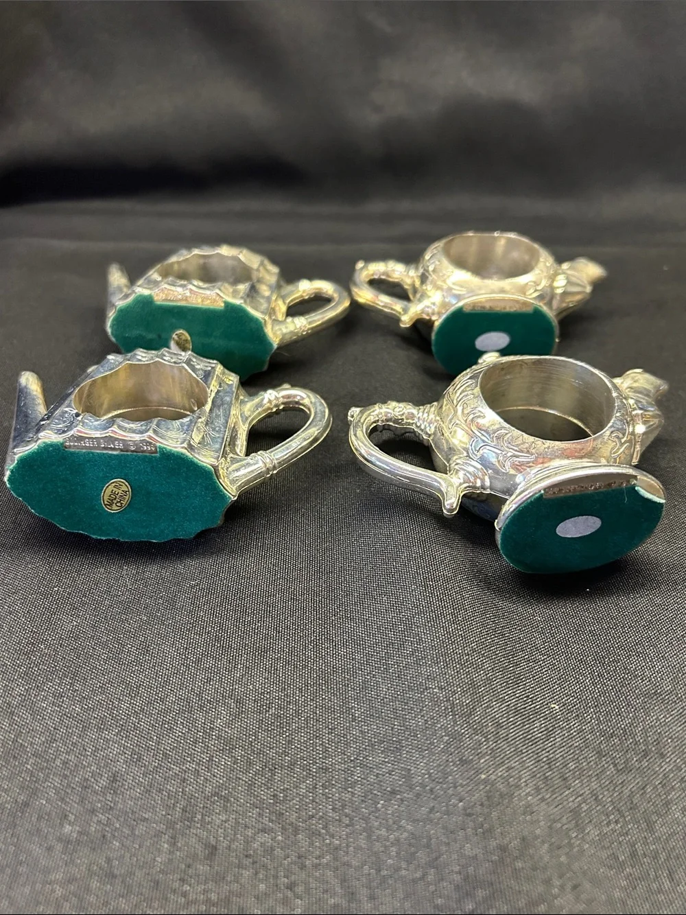 Vintage Godinger silver-plated teapot napkin rings. Set of 4
